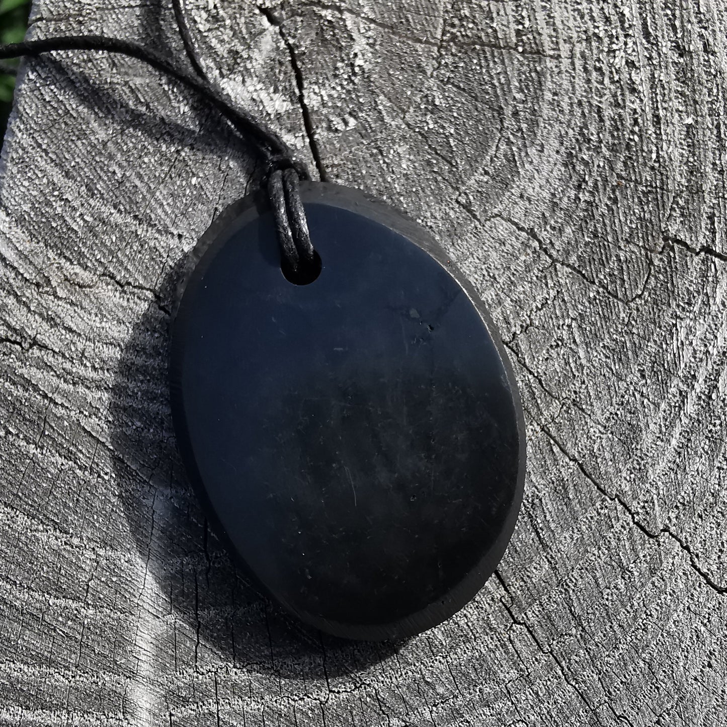 Shungite pendant oval with cotton ribbon