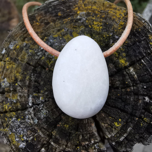 Barite pendant drilled with leather cord